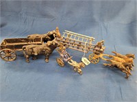 (3) Cast Iron Animal Drawn Wagons