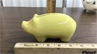 Yellow porcelain piggy bank