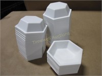 Box of small plastic trays