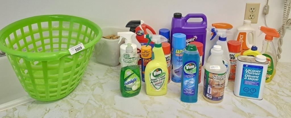 Cleaning supplies with laundry basket