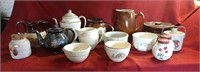 Stoneware pitchers, bowls, teapots, salt and