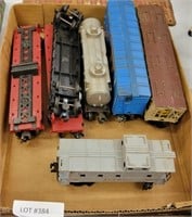 APPROX 7 TOY TRAIN CARS