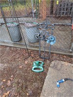 Hose Stand Shepherd Hook And Sprinkler Located A