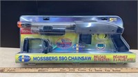 Unused Mossberg 590 Chainsaw Air Powered BB Gun.