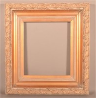 Contemporary Carved and Gilt-Molded Picture Frame.