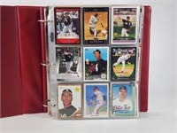 BINDER FULL OF ASSORTED BASEBALL CARDS