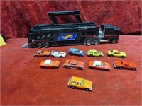 Hot wheel diecast cars w/truck carrier.