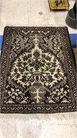 Brown and ivory oriental style rug in wool, 57 x