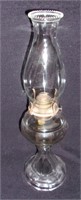 Vintage clear glass oil lamp.