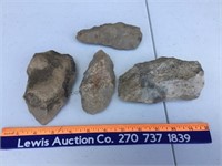 Stones possibly fashioned into tools or weapons.