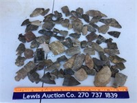 Assortment of broken arrowheads and stones ready