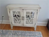 Ivory distressed accent cabinet