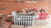 Gas cans, extension cord reel, baskets