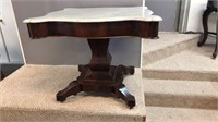 Early 1830s empire table with a marble top
