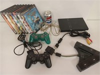 PS2 : console, deux manettes, accessoires et 7