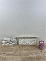 carved floating shelf and bird wall decor