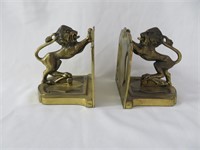 A Pair of Gilt Lion Form Bookends