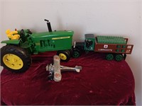 3 piece John Deere tractor Ertl bank and an iron