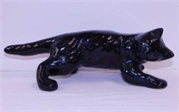 Black cat figurine w/ painted emerald eyes,