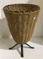 Decorative wicker plant holder with metal frame