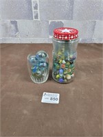 Vintage marbles and jar