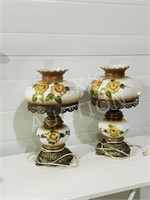 pair of vintage hand painted glass lamps