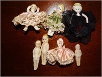 Vintage minature bisque dolls largest is 2 1/2"