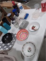 Kitchen dish ware 
2 Plates 
4 Bowls 
15 cups