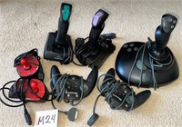 T - MIXED LOT OF VIDEO GAME CONTROLLERS (M24)