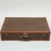 Louis Vuitton vintage suitcase with straps inside