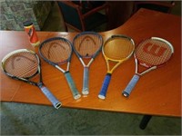 5 tennis rackets. Balls
