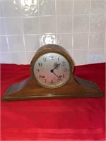 Vintage wooden mantle clock with key
