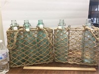 Green Bottles in Jute Rope & Metal Basket Holders