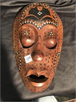 Carved wood inlaid mask from Indonesia