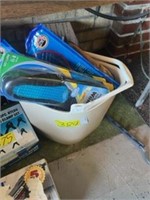 Bucket of shoe insoles