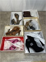 Assortment of high heels and boots, most appear