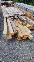 Stack of Lumber, Some Posts, Some Treated