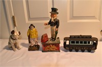 Cast iron objects: Uncle Sam mechanical bank, trol