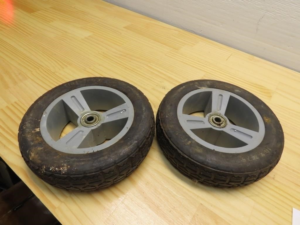 (2)solid rubber cart tires.