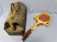 Old doctor's bag and two old tennis rackets