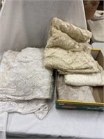 Box of linens - crocheted tablecloth, machine made