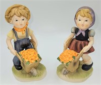 Boy and Girl Figures Wheelbarrow of Flowers