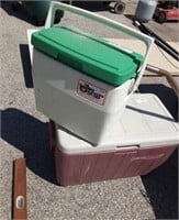 2 coolers small Coleman and larger Brown and tan