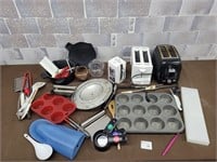 Toaster, muffin pans, measuring cups, kitchen tool