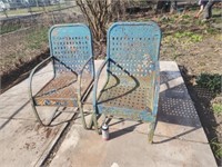 Two spring steel lawn chairs.