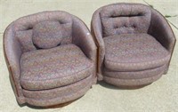 Matching pair of swivel occasional side chairs.