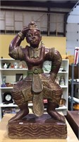 Oriental wooden carved figure, 26 inches tall,