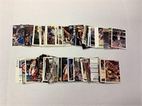 approximately 100 sports cards