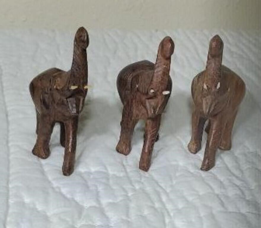 3 hand carved wood elephants