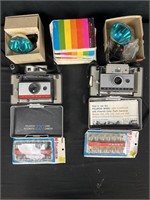 2 Polaroid cameras with flash and bulbs and film
